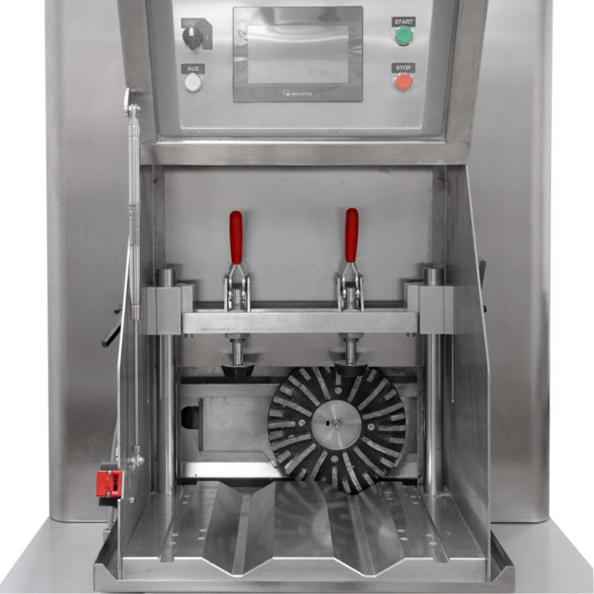 Concrete Cylinder End Grinder, TRIM, detail of the grinding chamber with automatic cradle